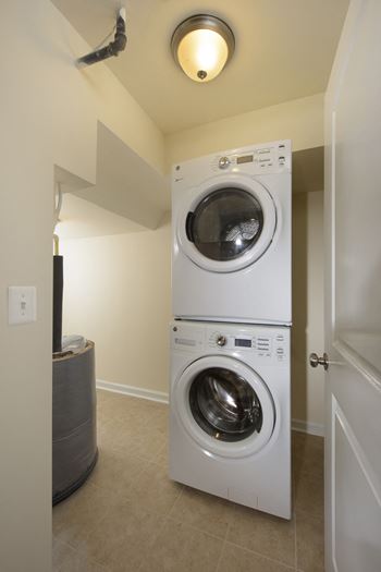 Washer and dryer in select units